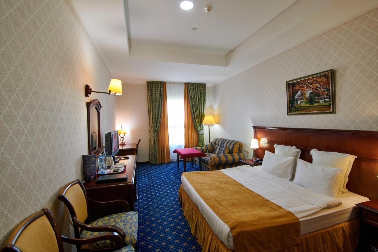 Grand Hotel Victory Aktau  Eksteriør billede A room at the hotel