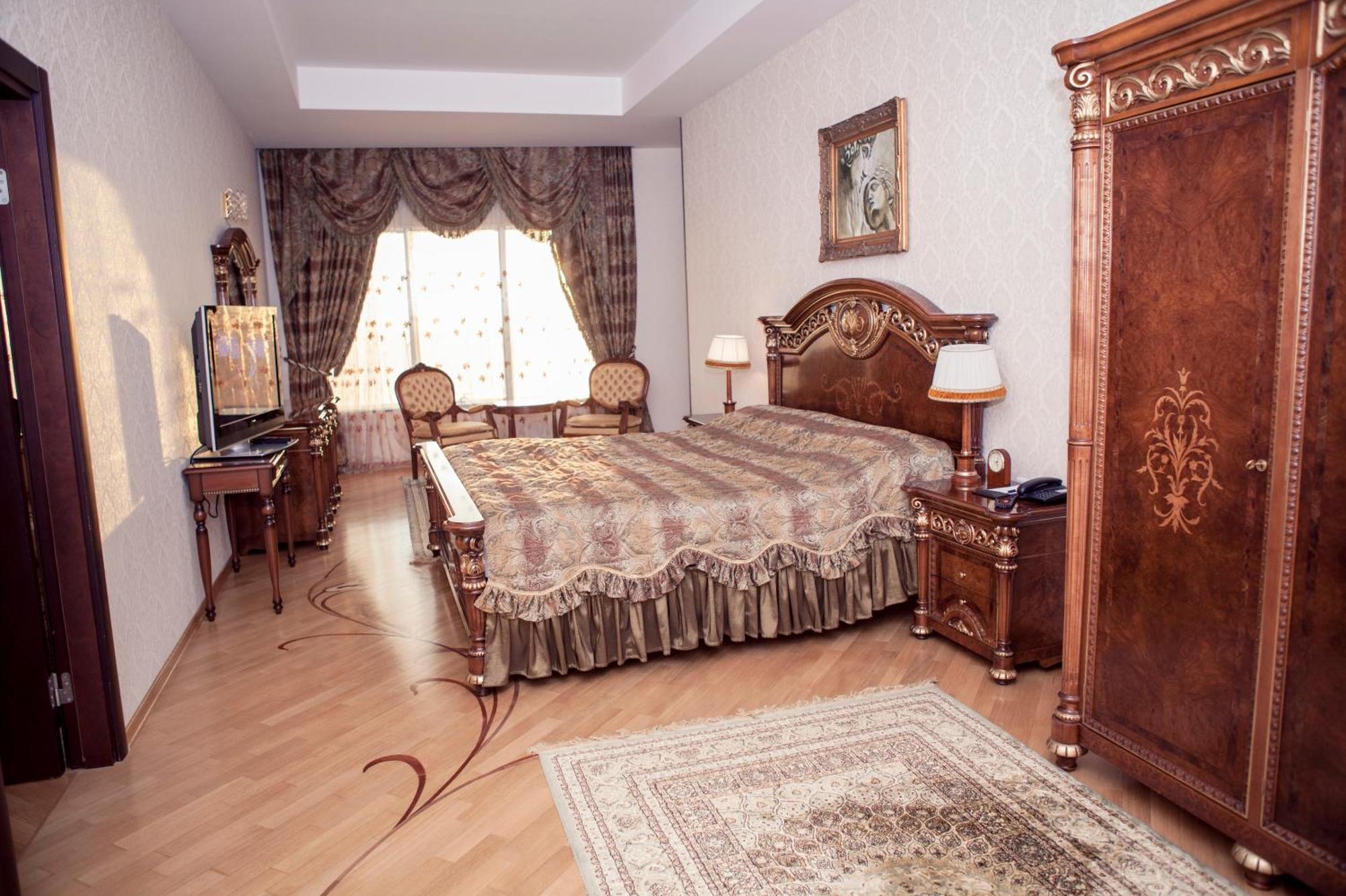 Grand Hotel Victory Aktau  Eksteriør billede A bedroom